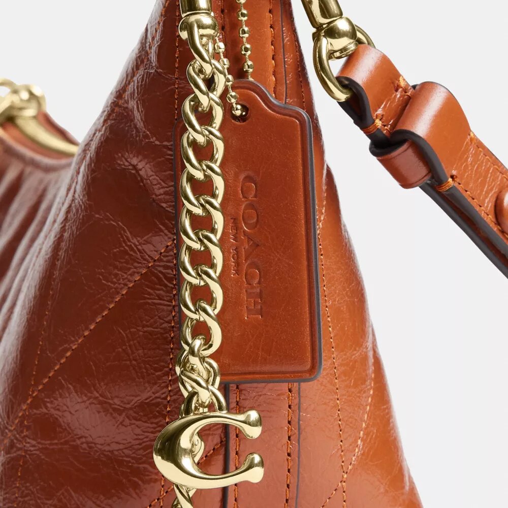 Caitlin Shoulder Bag with Quilting and Charm
