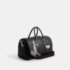 Disney X Coach Compass Bag 35 with Pluto