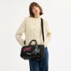 Disney X Coach Compass Bag 35 with Pluto