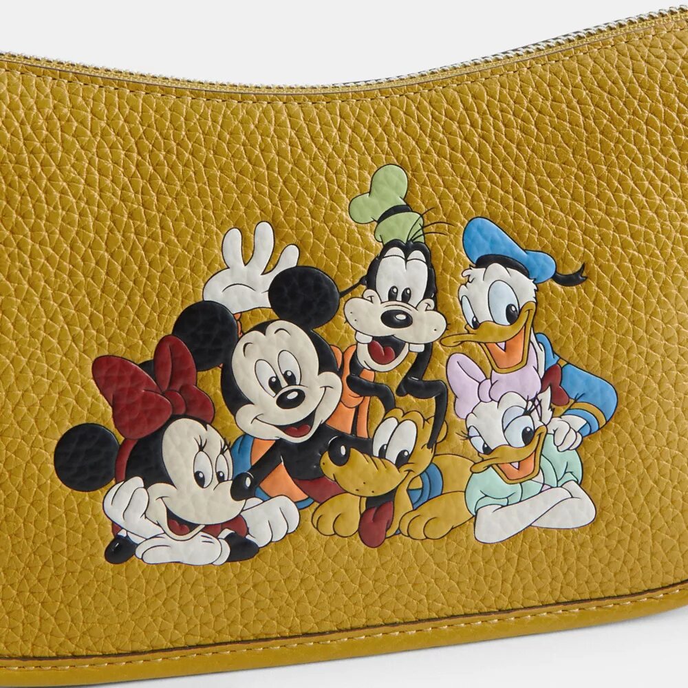 Disney X Coach Swinger Bag in Regenerative Leather with Mickey Mouse and Friends