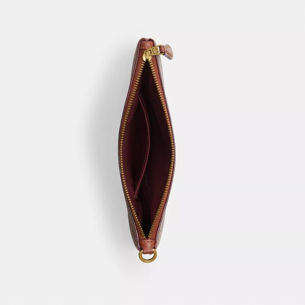 Essential Small Wristlet in Signature Canvas with Holiday Gifts