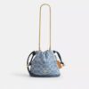 Faye Mini Drawstring Bag in Signature Denim