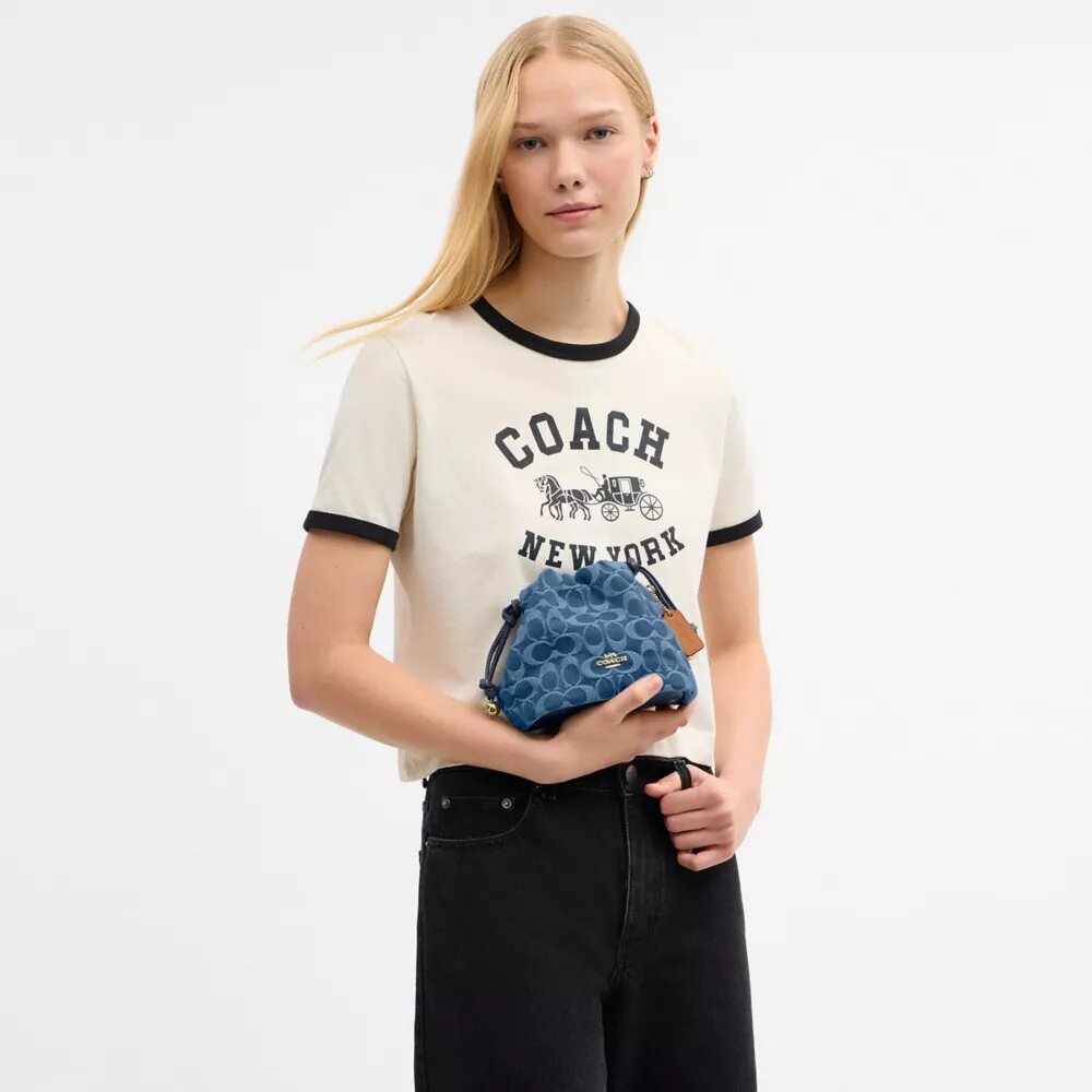 Faye Mini Drawstring Bag in Signature Denim