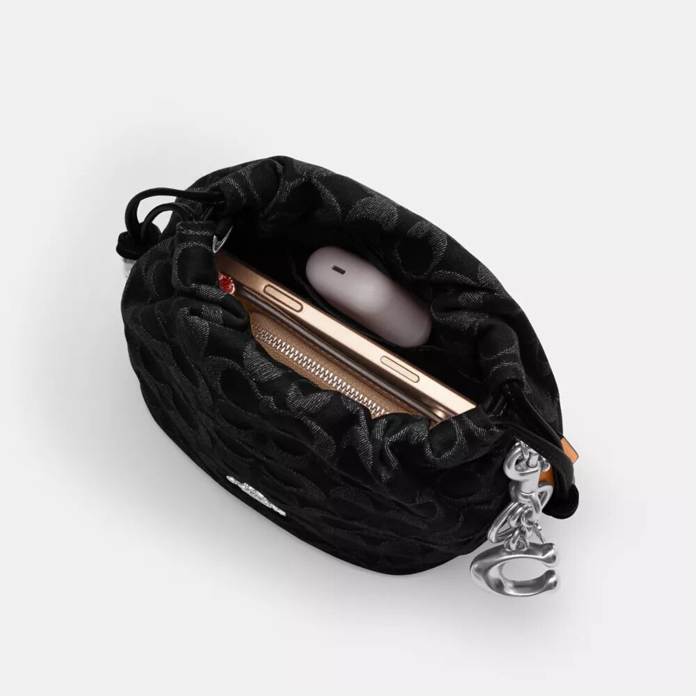 Faye Mini Drawstring Bag in Signature Denim