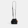 Faye Mini Drawstring Bag in Signature Denim