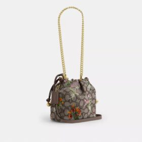 Faye Mini Drawstring Bag in Signature Jacquard with Floral Embroidery