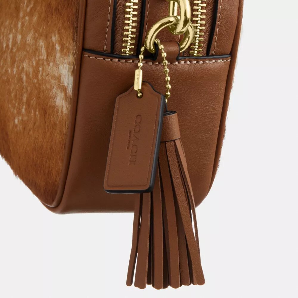 Mini Carey Crossbody Bag in Haircalf with Cow Print