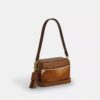 Mini Carey Crossbody Bag in Haircalf with Cow Print