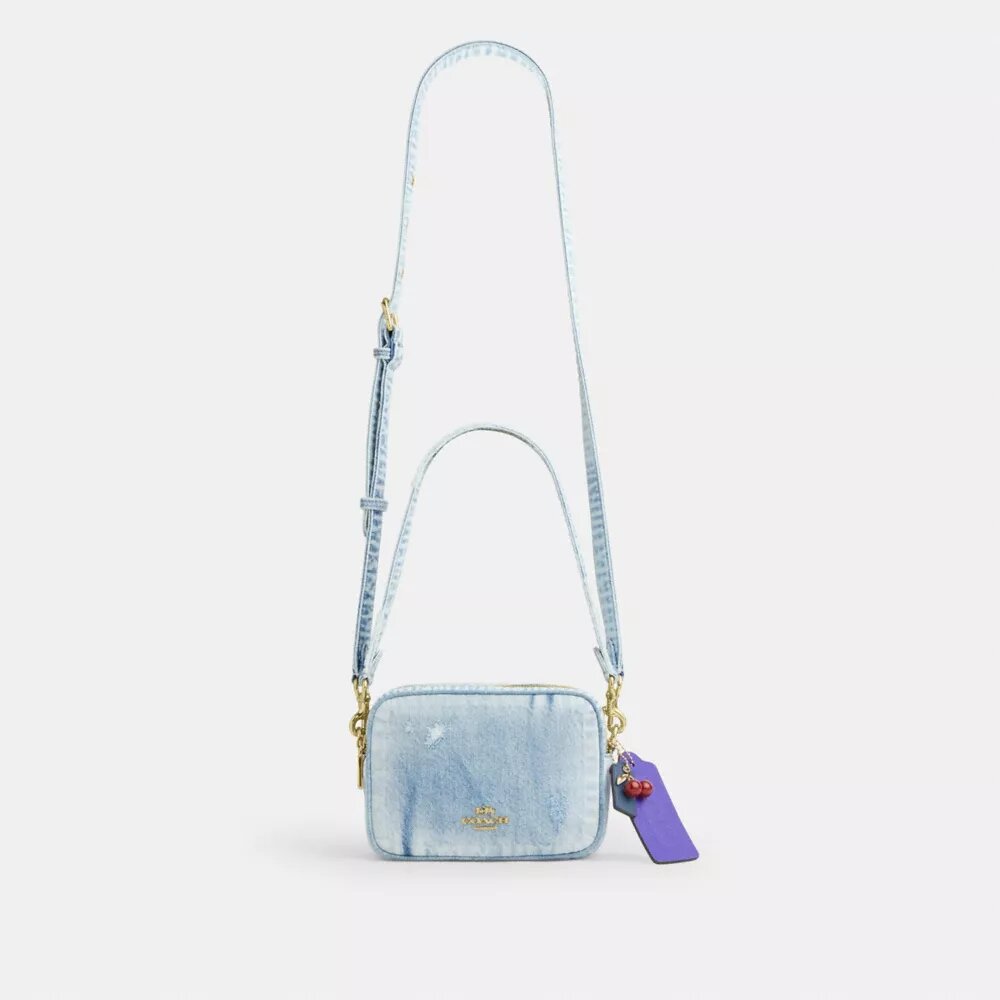 Mini Carey Crossbody Bag in Loved Denim with Charms