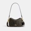 Mini Carey Crossbody Bag in Loved Signature Canvas