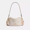 Mini Carey Crossbody Bag in Signature Canvas