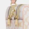 Mini Carey Crossbody Bag in Signature Canvas