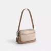 Mini Carey Crossbody Bag in Signature Canvas