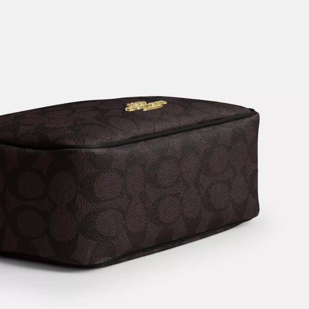 Mini Carey Crossbody Bag in Signature Canvas