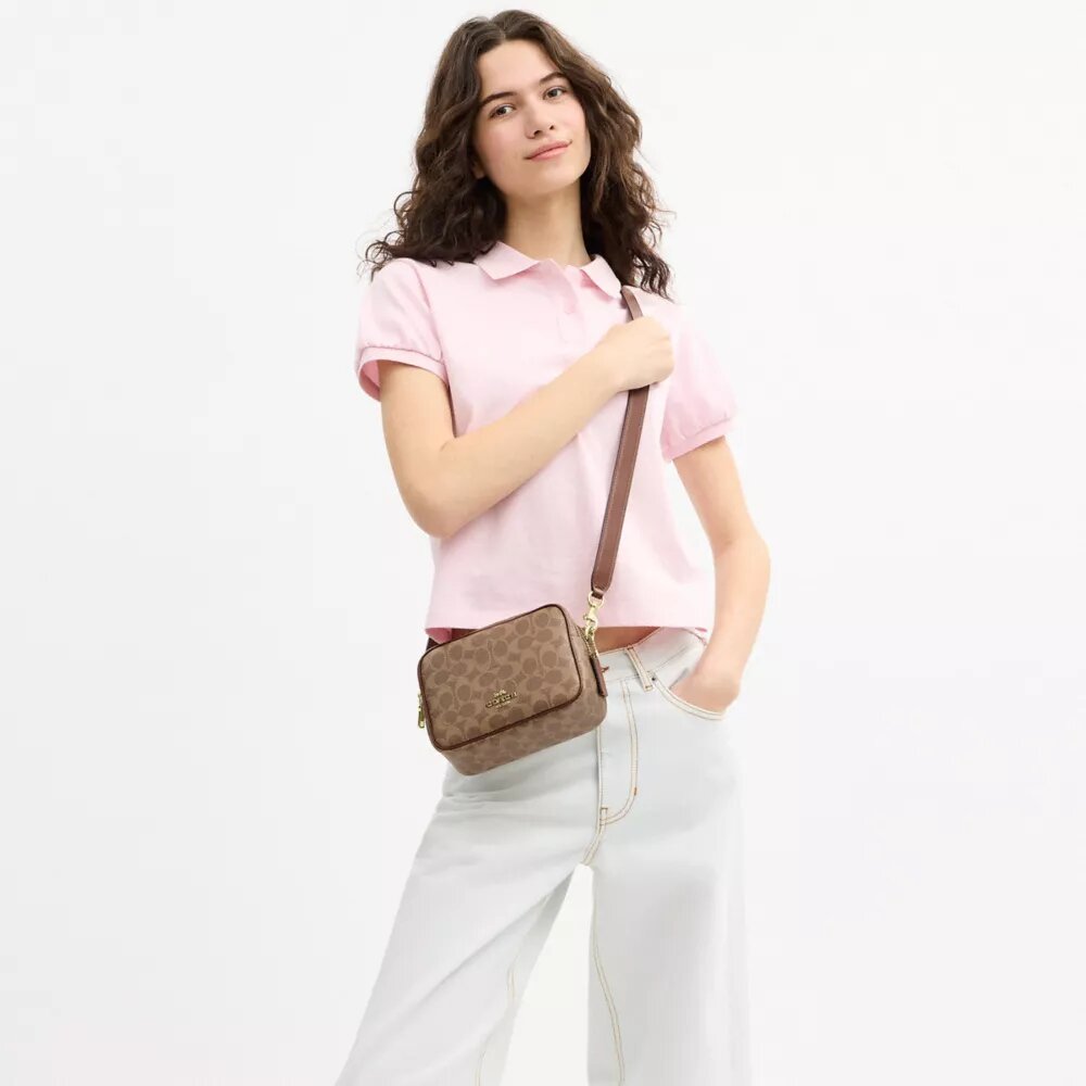 Mini Carey Crossbody Bag in Signature Canvas