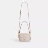 Mini Carey Crossbody Bag in Signature Canvas