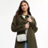 Mini Carey Crossbody Bag in Signature Canvas
