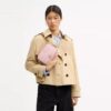 Mini Carey Crossbody Bag in Signature Canvas with Charms