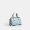 Mini Rowan Crossbody Bag in Signature Canvas