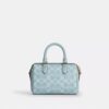 Mini Rowan Crossbody Bag in Signature Canvas