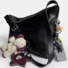 Mott Messenger Bag 38 in Loved Leather with Charms