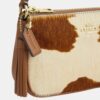 Nolita 19 in Haircalf with Cow Print
