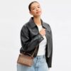 Rainer Crossbody Bag 18 in Signature Canvas