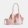 Rowan Bucket Bag in Signature Canvas with Charms