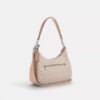 Teri Hobo Bag in Signature Canvas