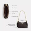 Teri Mini Crossbody Bag in Signature Canvas