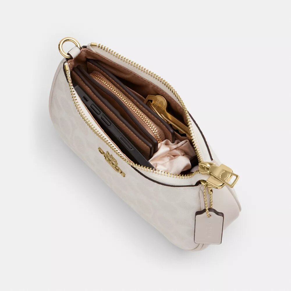 Teri Mini Crossbody Bag in Signature Canvas