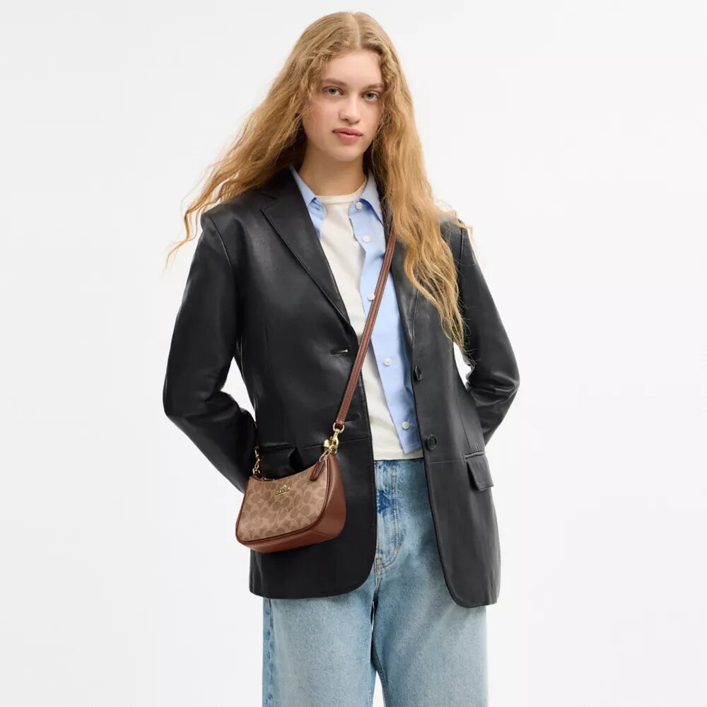 Teri Mini Crossbody Bag in Signature Canvas