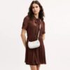 Teri Mini Crossbody Bag in Signature Canvas