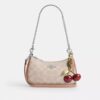 Teri Mini Crossbody Bag in Signature Canvas