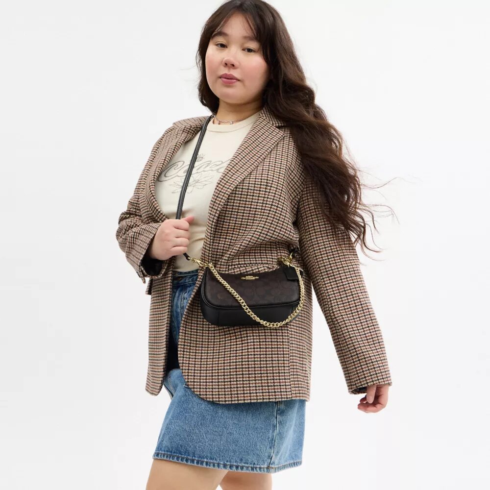 Teri Mini Crossbody Bag in Signature Canvas