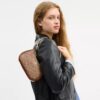 Teri Mini Crossbody Bag in Signature Canvas