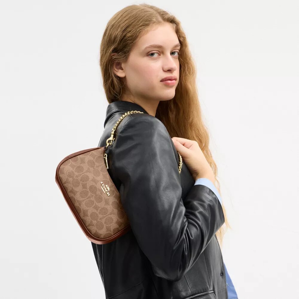 Teri Mini Crossbody Bag in Signature Canvas