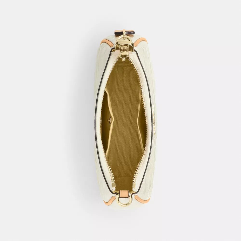Teri Mini Crossbody Bag in Signature Leather